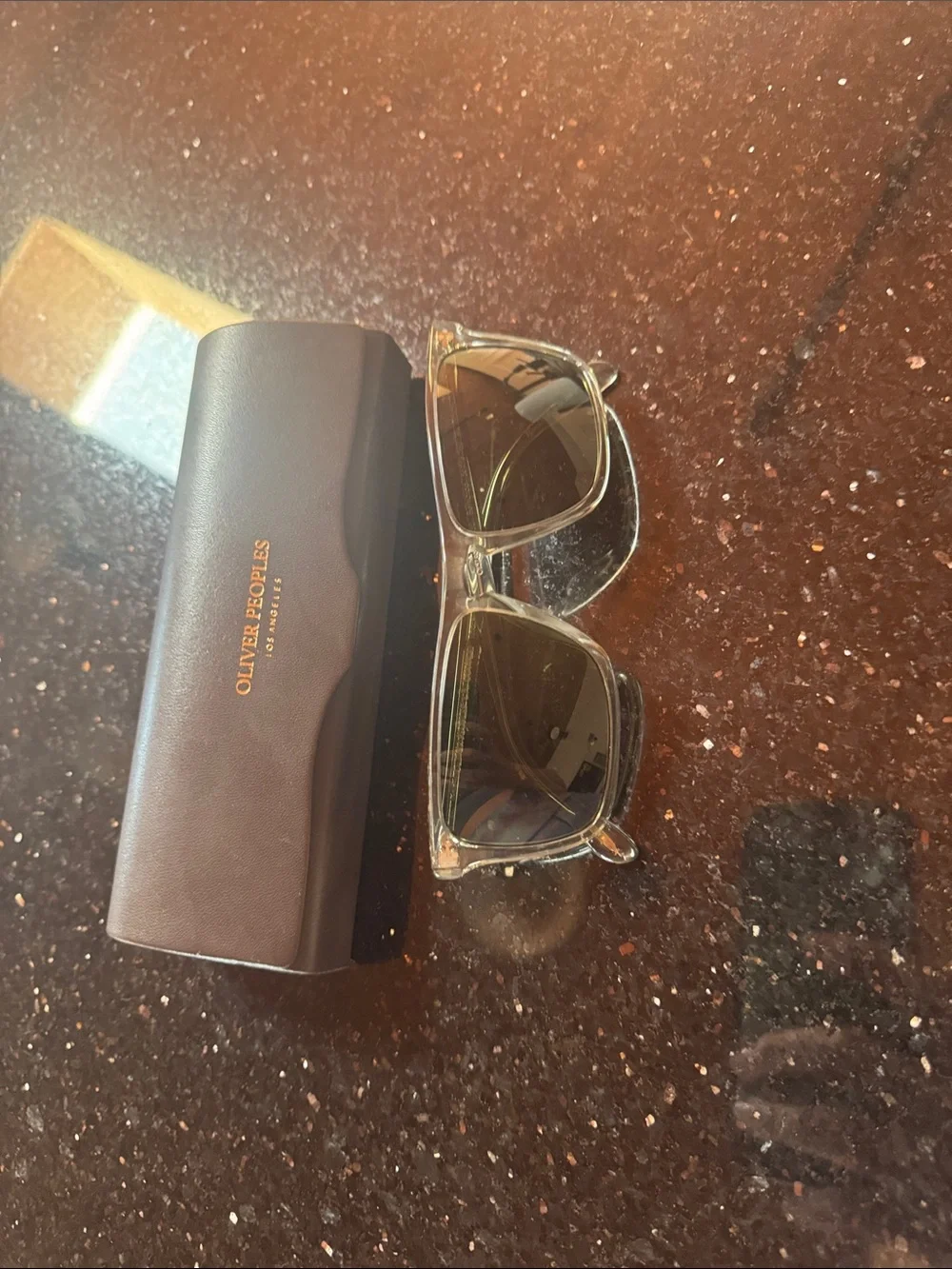 Oliver Peoples Clear Acetate Sunglasses with Green Lenses